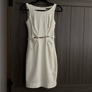 Classy White Dress with pleats and a gold belt